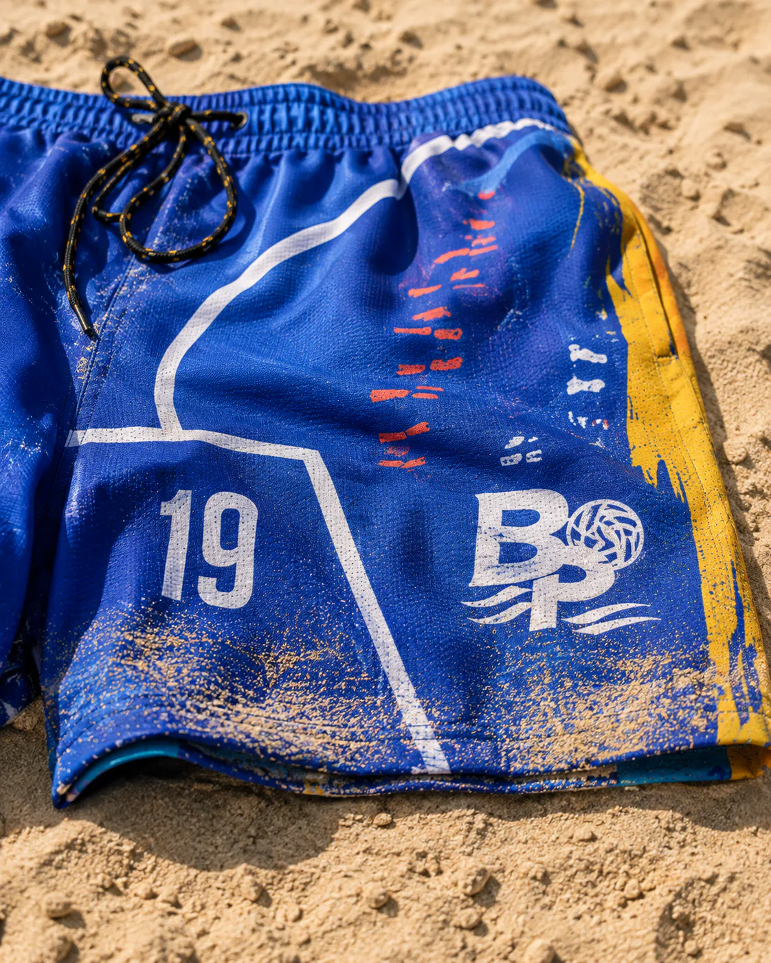 Breakpoint Beach Volleyball Crew — Sand-covered shorts detail